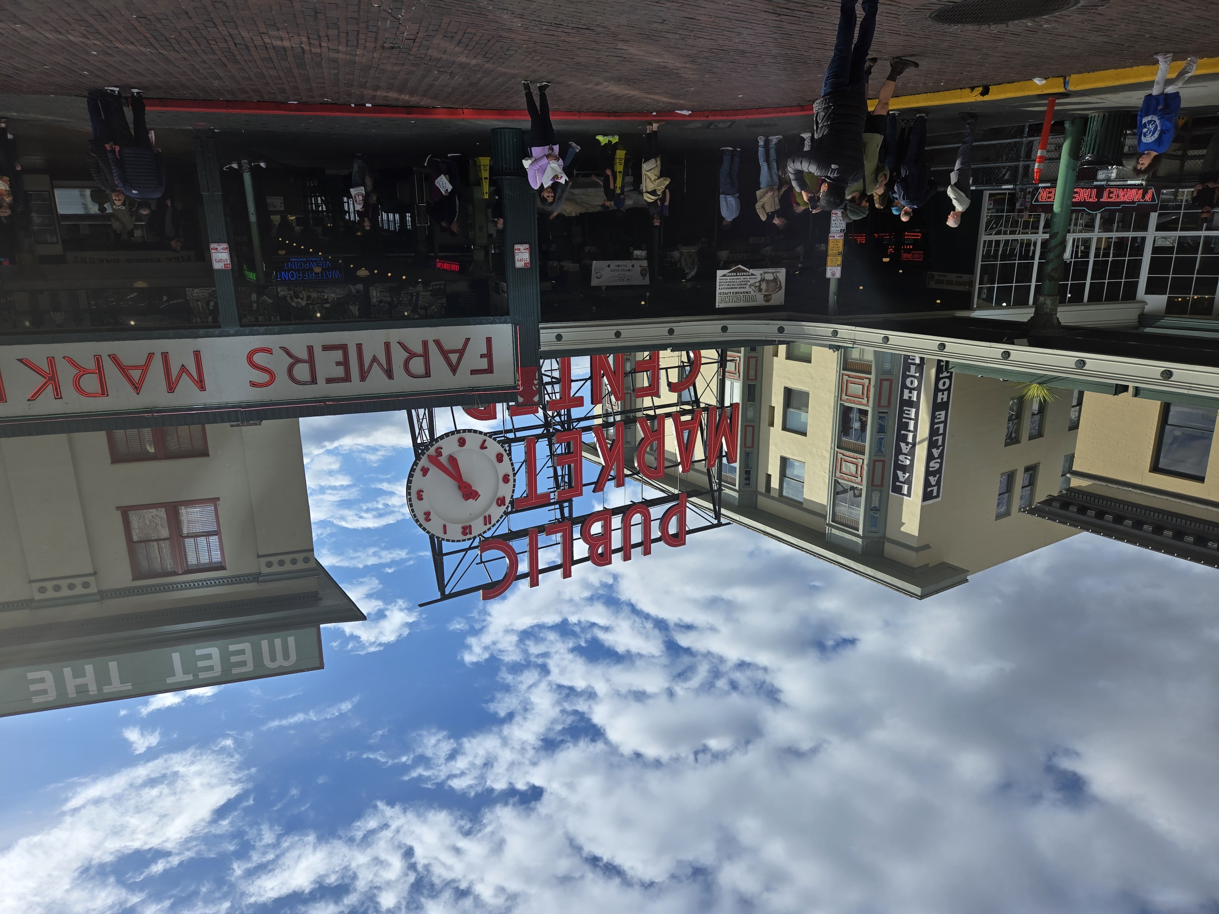 A red Public Market Center sign