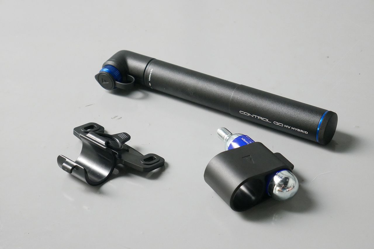 Best bike mini pumps group test 2026 - Giant Contact Go in black/blue set to a grey background with its mount and CO2 carrier seperately