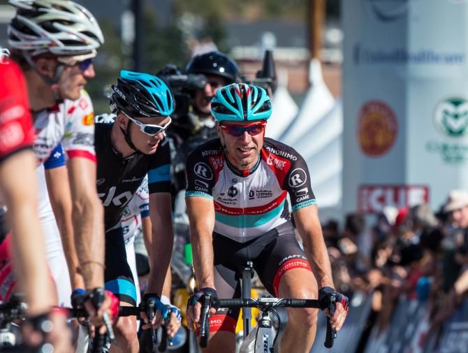 Froome (Sky) is famous for looking at his stem, here he checks out Voigt's (Radioshack) stem for a bit of variety