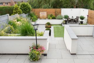 tiered garden ideas: white contemporary paving with levels