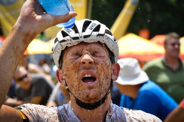 A racer recovers after finishing in Sabie