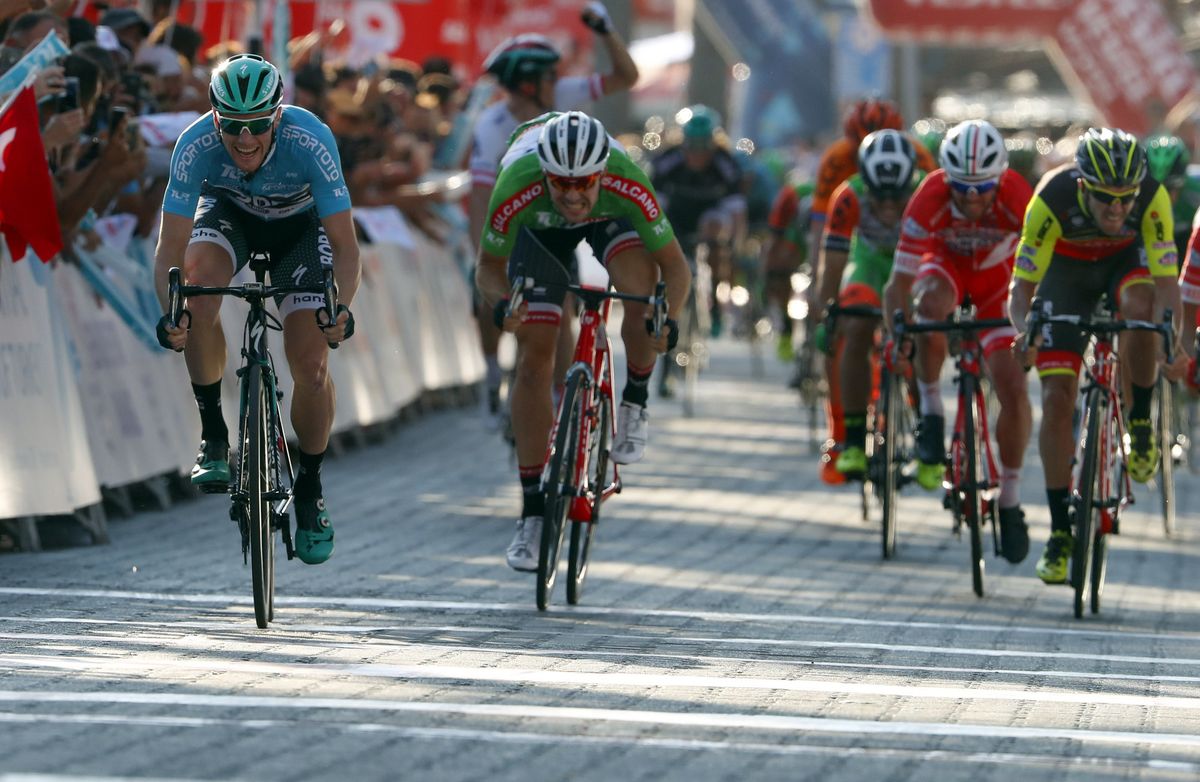 Sam Bennett powers away from Theuns and Consonni