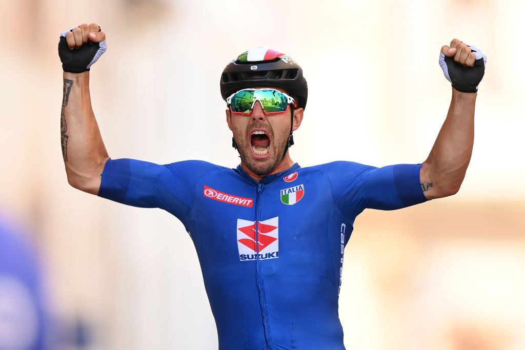 TRENTO ITALY SEPTEMBER 12 Sonny Colbrelli of Italy celebrates winning during the 27th UEC Road Cycling European Championships 2021 Elite Mens Road Race a 1792km race from TrentoPiazza Duomo to TrentoPiazza Duomo UECcycling on September 12 2021 in Trento Italy Photo by Justin SetterfieldGetty Images