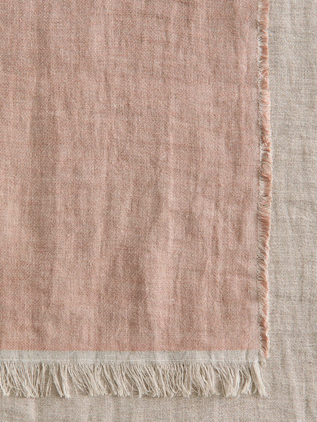 A two-toned linen blanket in dusty rose from H&amp;amp;M