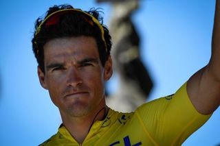 Greg Van Avermaet (BMC) waves to the crowd in his yellow jersey