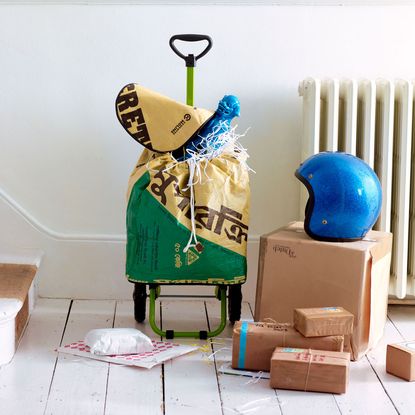 white wall with boxes and blue helmet