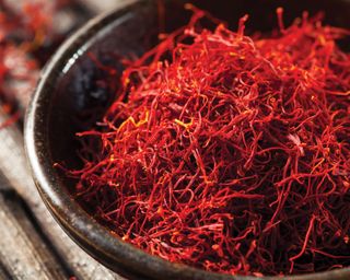 bowl of bright red dried saffron threads