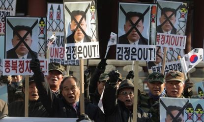 South Koreans protest at an anti-North Korea rally following the North's launch of long-range missile on Dec. 12.