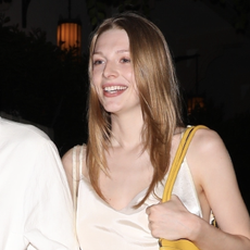 Euphoria star Hunter Schafer is all smiles as she's spotted leaving the Chateau Marmont Hotel with a friend after enjoying her night out in Los Angeles. The 26 year old actress and model wore beige trousers, black boots, a sleeveless top and carrying a yellow large Prada leather bag.