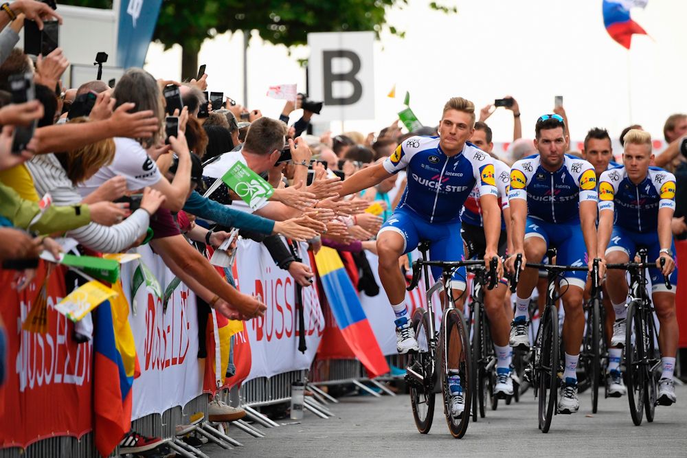 Marcel Kittel (L) and his teammates parade during the team presentation ceremony in Dusseldorf, Germany
