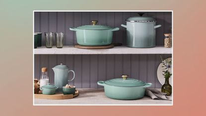 New Le Creuset color, sage, in two rows of cookware in the kitchen 
