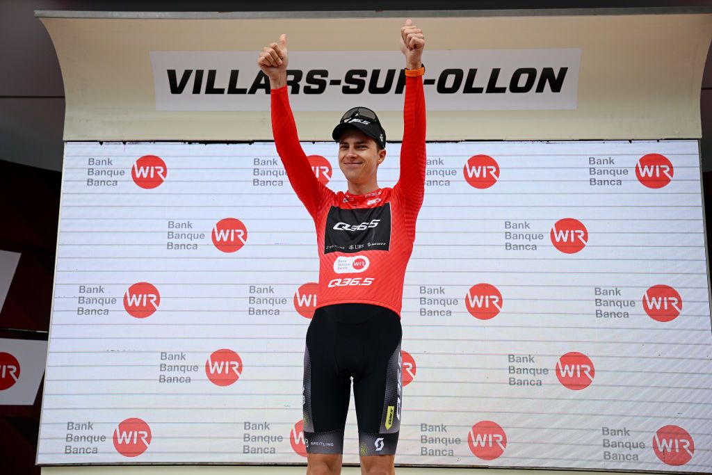 VILLARSSUROLLON SWITZERLAND JUNE 13 Nickolas Zukowsky of Canada and Q365 Pro Cycling Team celebrates at podium as Red Mountain Jersey winner during the 86th Tour de Suisse 2023 Stage 3 a 1438km stage from Tafers to VillarssurOllon 1256m UCIWT on June 13 2023 in VillarssurOllon Switzerland Photo by Dario BelingheriGetty Images