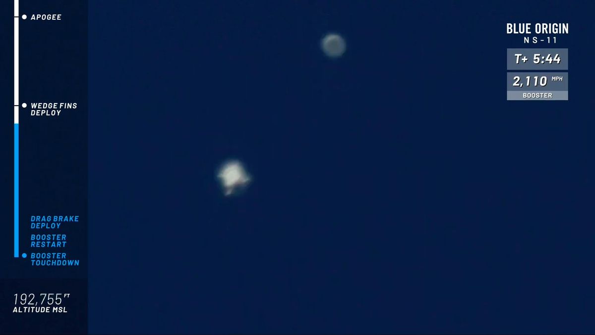 A closer look of the New Shepard booster (lower left) and capsule after separation.