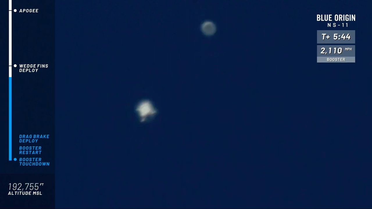 A closer look of the New Shepard booster (lower left) and capsule after separation.