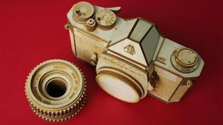 This affordable retro camera remake is made entirely out of wood &ndash; and it's so accurate, even the lens twists off