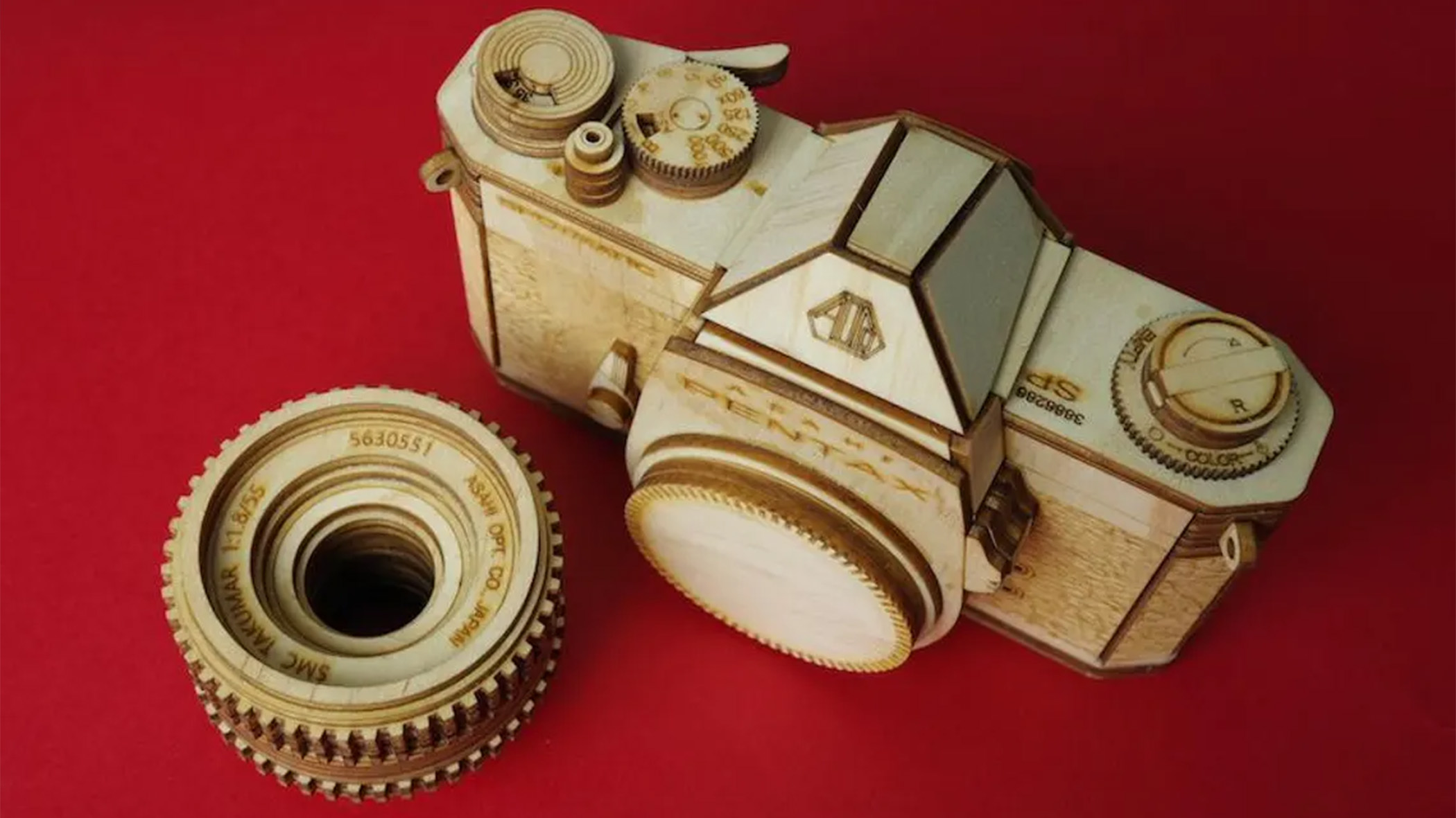A wooden model camera.