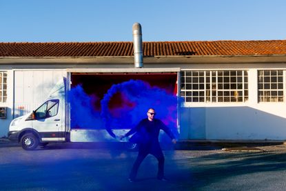 Portait of Rodolfo Agrella with blue powder