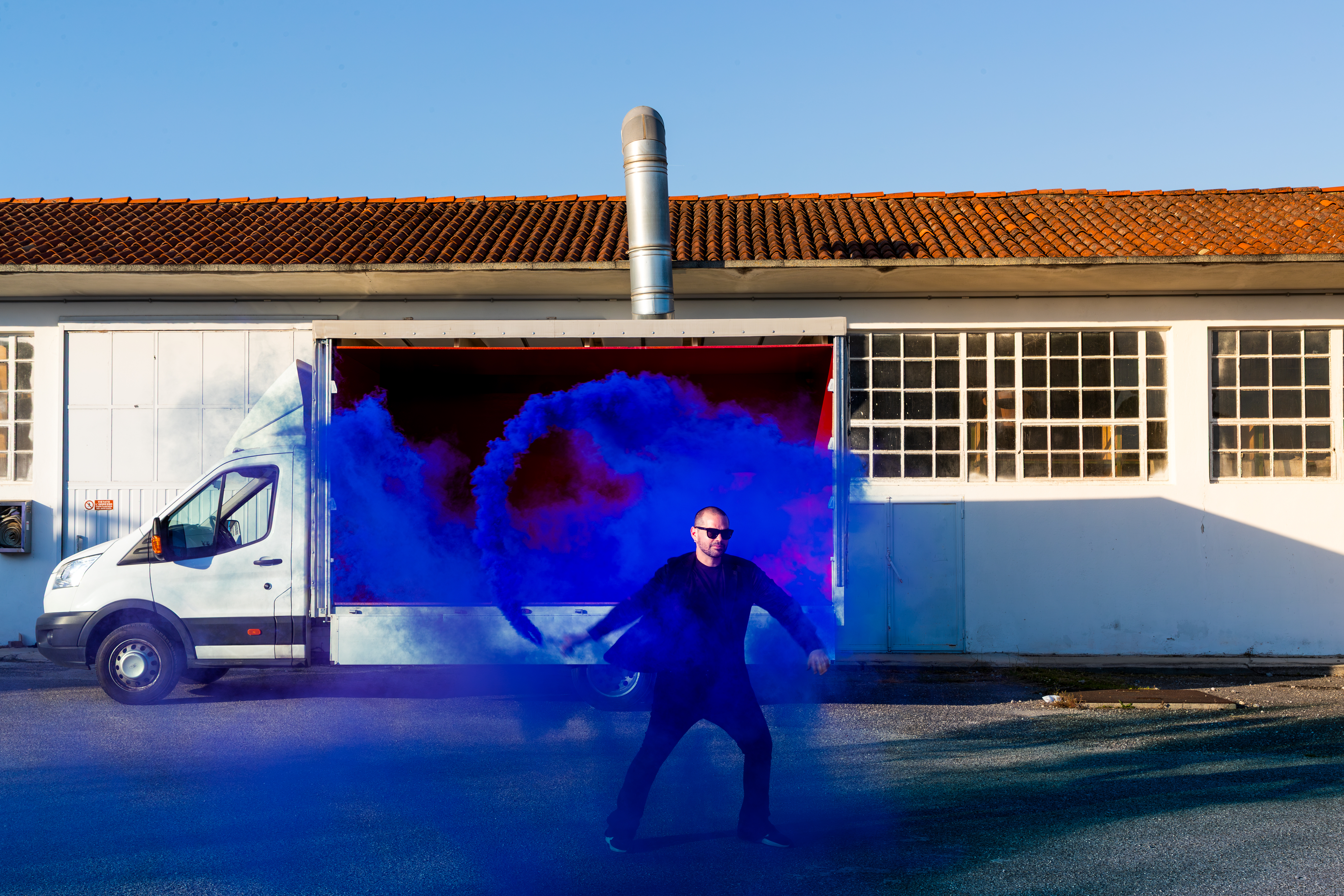 Portait of Rodolfo Agrella with blue powder