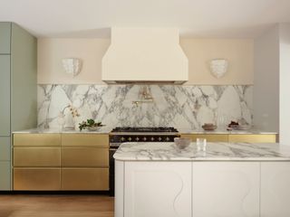a modern kitchen design with a decorative wall sconce