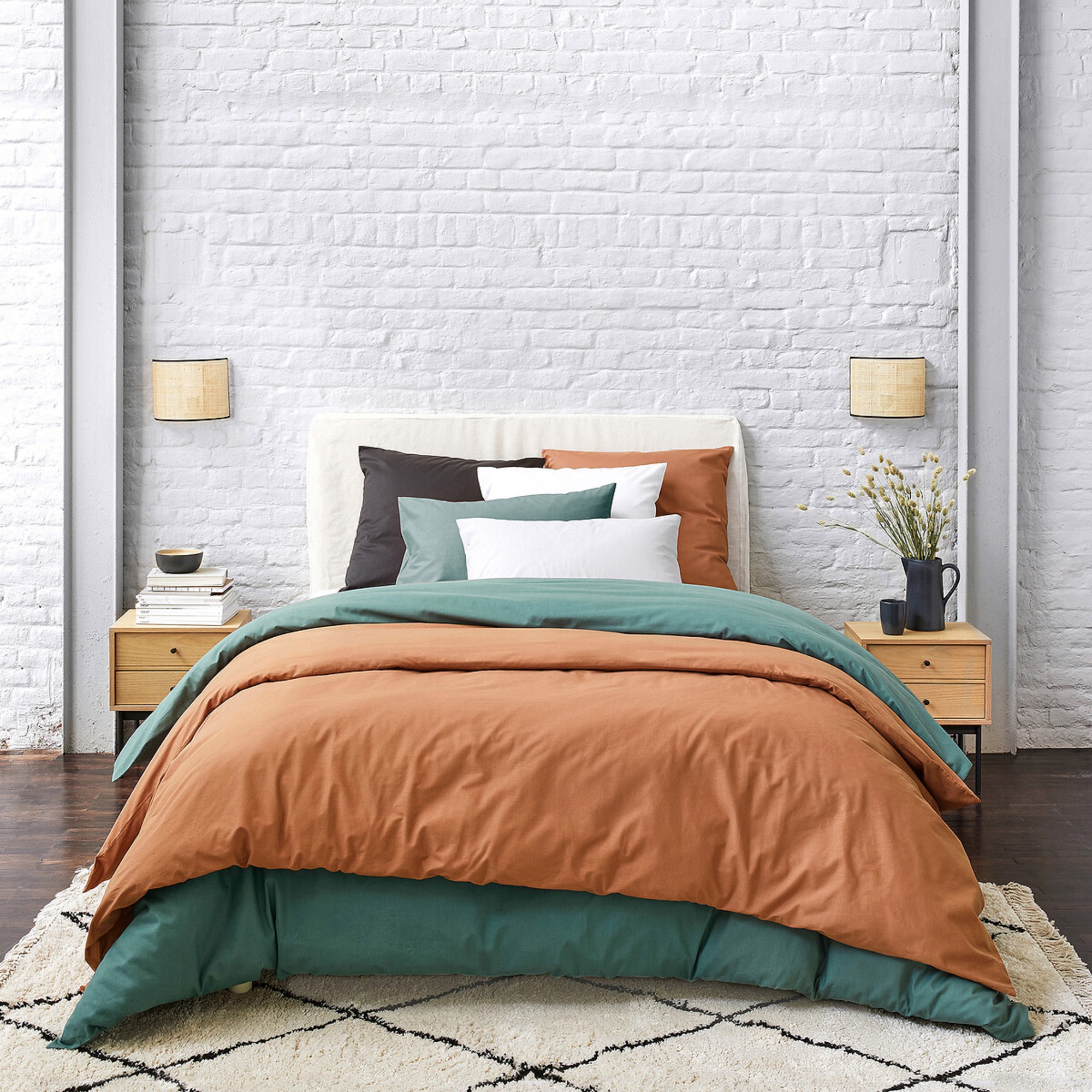 La Redoute&#039;s Jiraya Fringed Berber-Style Rug in a loft-style bedroom