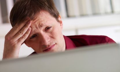 Stressed man computer