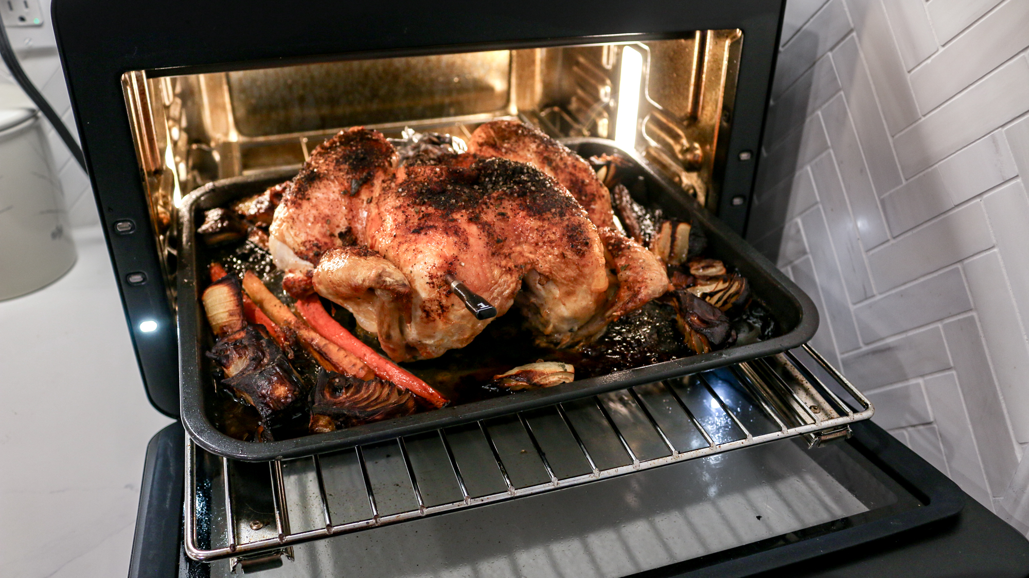CHEF iQ MiniOven on a kitchen counter