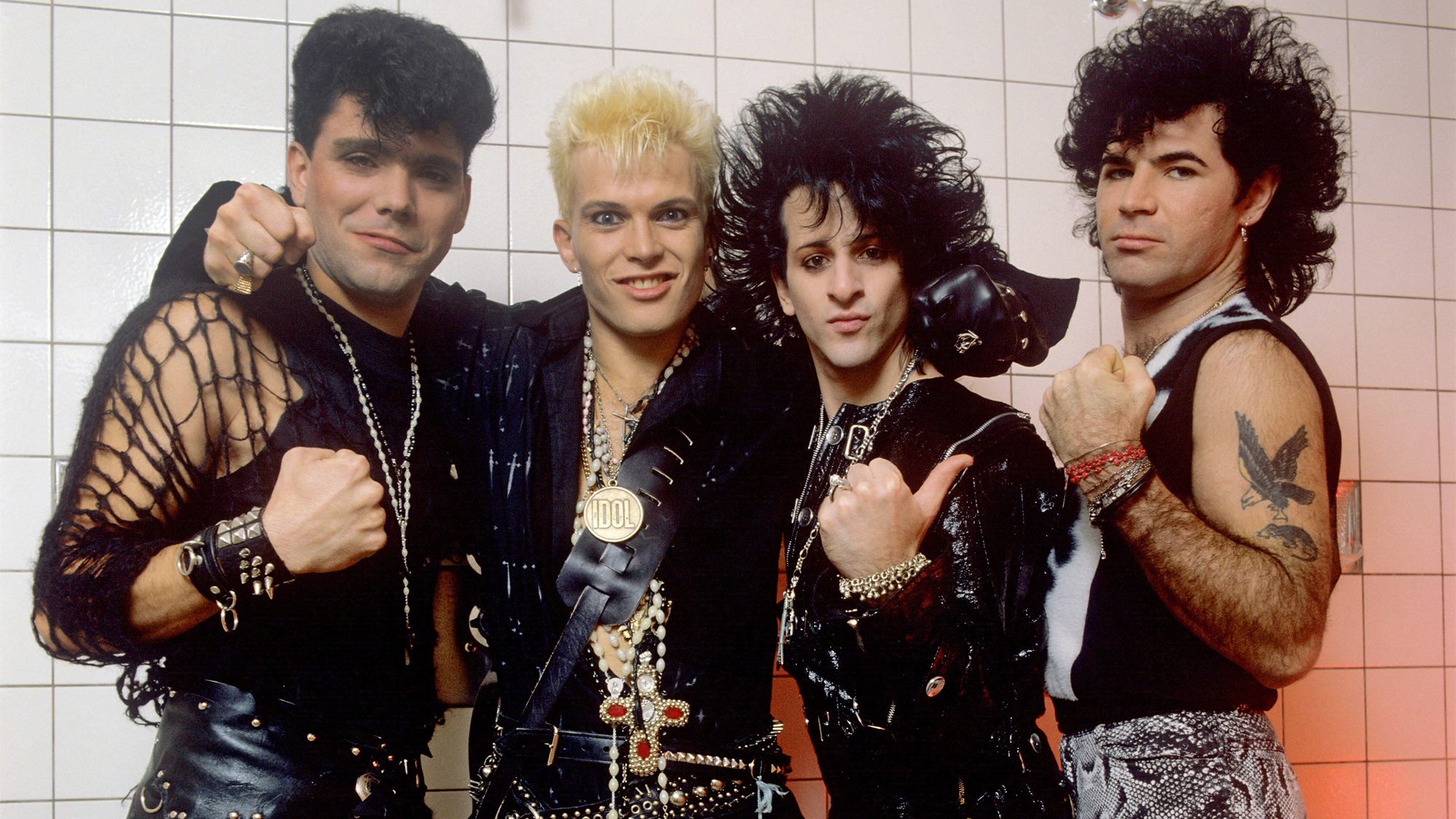 Billy Idol (left center) and Steve Stevens (right center) pose with bandmates on the Rebel Yell tour, in Dortmund, Germany, November 1, 1984