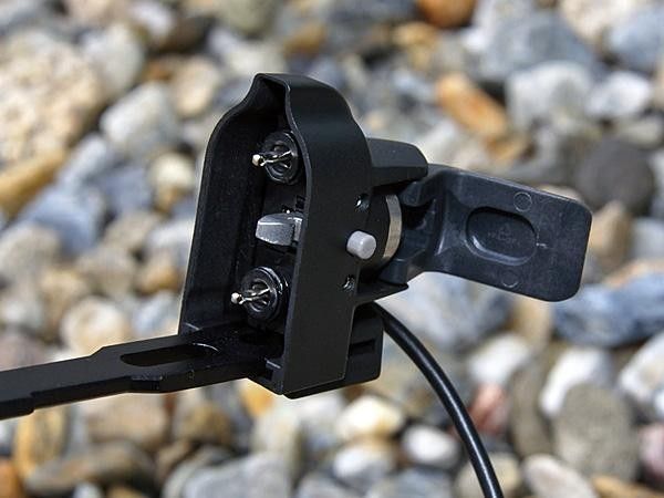 A lever pulls the battery in tight and the o-ring seals should hopefully hold up well over time.