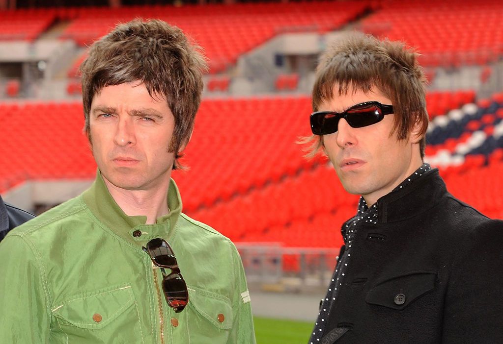 Noel Gallagher (left) and Liam Gallagher of Oasis pose at Wembley Stadium on October 16, 2008