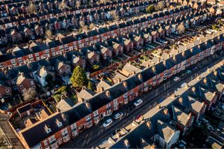 An overhead shot of terraced UK homes