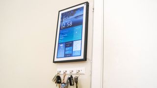 The Amazon Echo Show 15 mounted vertically on a wall