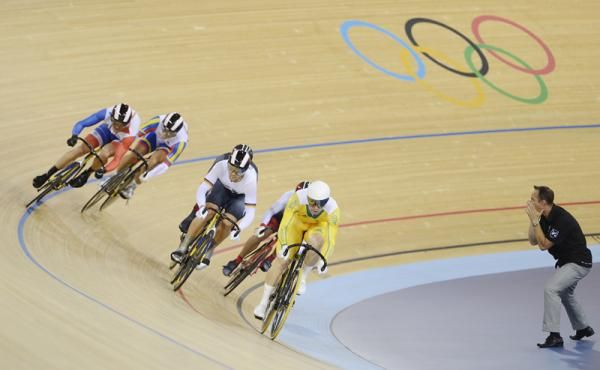 Shane Perkins (Australia) leads Maximilian Levy (Germany) in their keirin second round heat.