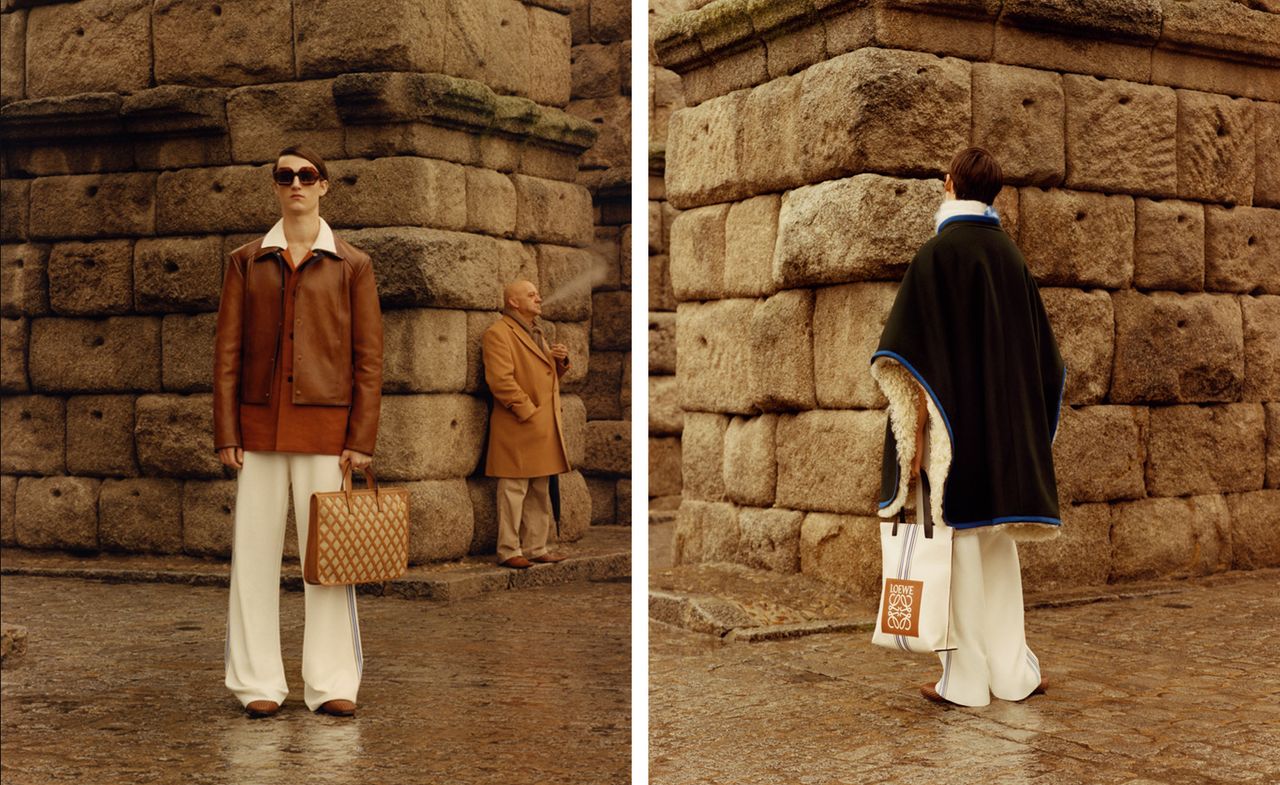 Male models wearing qhite suits and dark jackets from the Loewe AW2015 collection