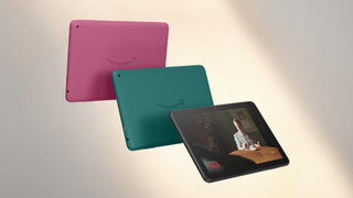 Three Amazon Fire HD 8 (2024) tablets, one in pink, one in green floating in front of it, and a black one showing a screen in front of them both.