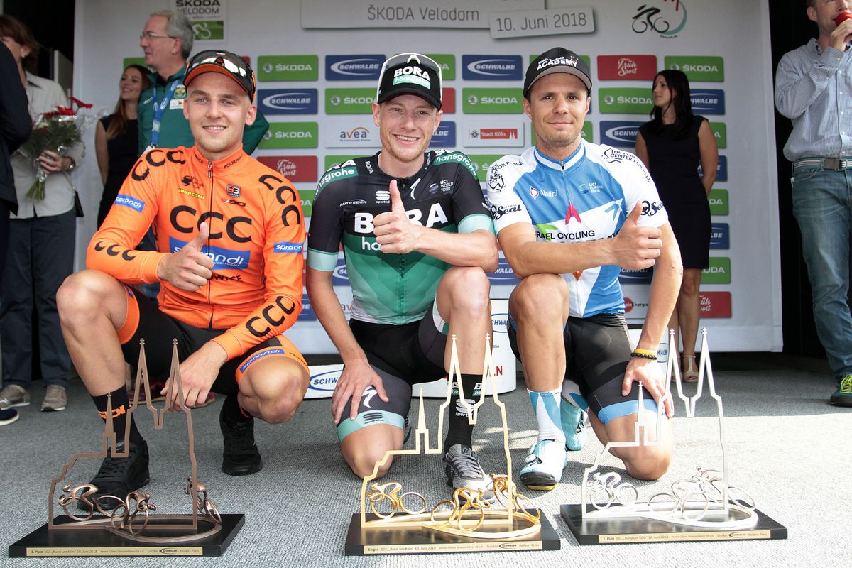 Szymon Sajnok, Sam Bennett and Mihkel Raim on the podium