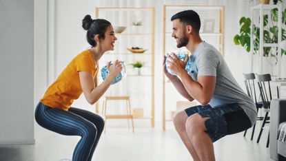 Couple doing a resistance training workout