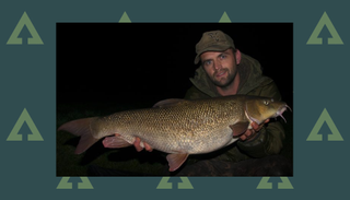 Justin Stoddart braced his shock Trent sturgeon with this giant barbel