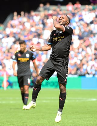 Sterling celebrates scoring City's third of the match