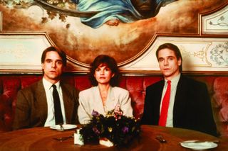 Jeremy Irons plays identical twin brothers opposite Genevieve Bujold in David Cronenberg's 'Dead Ringers'.