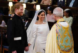 Prince Harry and Meghan Markle during their wedding service at St George's Chapel, Windsor Castle.
