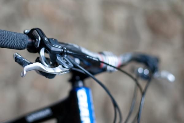 The Fox Racing Shox remote lock-out lever is tucked neatly next to the Shimano XTR shifter.