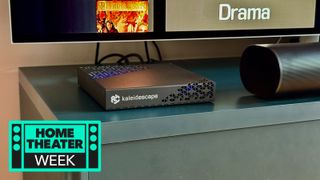 Kaleidescape Strato E Movie Player on a blue TV unit.