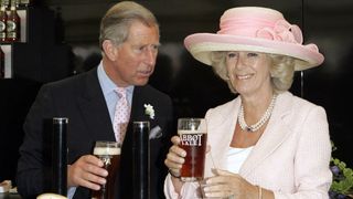 Camilla and Charles with ale.
