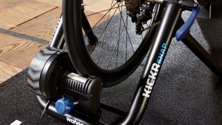 cloe up of a wheel mounted on the Wahoo Kickr Snap turbo trainer