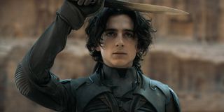 Timothee Chalamet holding knife to head in Dune movie