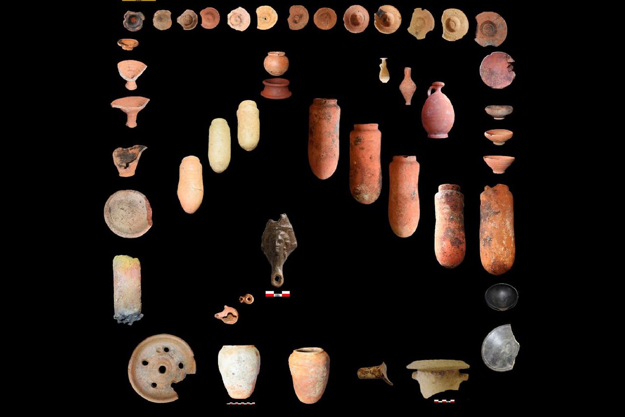 Over a dozen terra cotta masks and figures