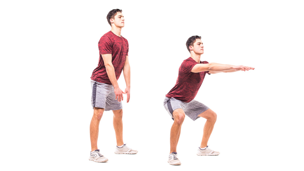 Person with kettlebell doing a sumo squat Stock Photo