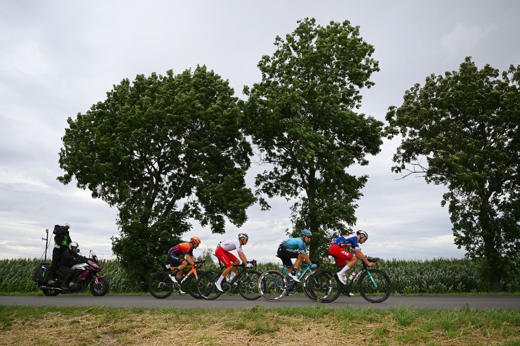 OPOLE POLAND AUGUST 01 LR Sebastian Schnberger of Austria and Team Human Powered Health Norbert Banaszek of Poland and Team Poland Yevgeniy Gidich of Kazakhstan and Astana Qazaqstan Team and Patryk Stosz of Poland and Team Poland Blue Best Polish Rider Jersey compete in the breakaway during the 80th Tour de Pologne 2023 Stage 4 a 1991km stage from Strzelin to Opole UCIWT on August 01 2023 in Opole Poland Photo by Dario BelingheriGetty Images