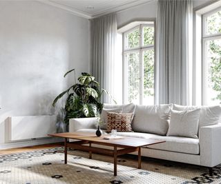 white radiator on wall in living room