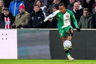 Igor Paixao of Feyenoord kicks the ball during the Dutch Eredivisie match between PSV and Feyenoord at Philips Stadion on December 22, 2024 in Eindhoven, Netherlands.